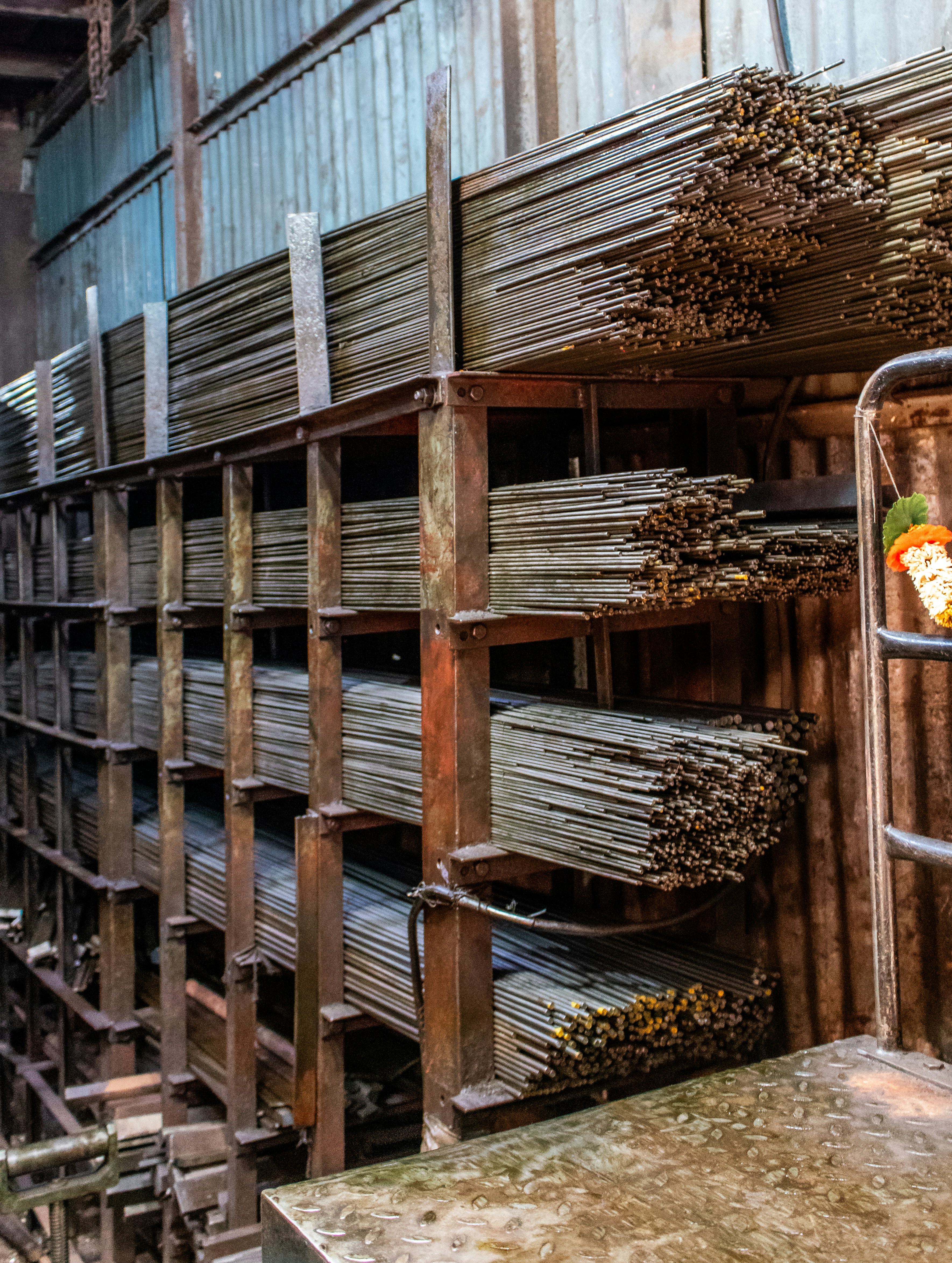 Metal bars stacked in warehouse storage