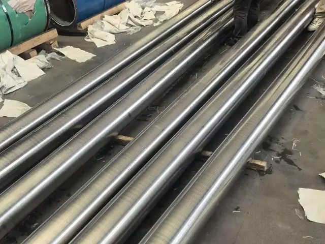 Long alloy bars laid out for inspection