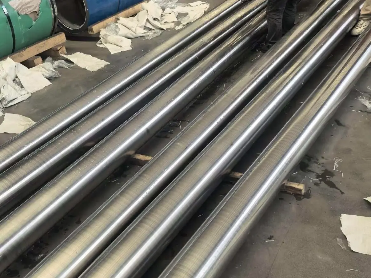 Long nickel alloy bars prepared for inspection