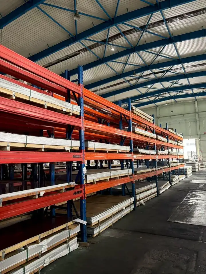 Plate materials stored on protective warehouse racks