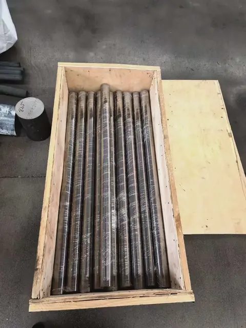 Wrapped bars in a wooden case as a packing example; crate grade is not established by this photograph