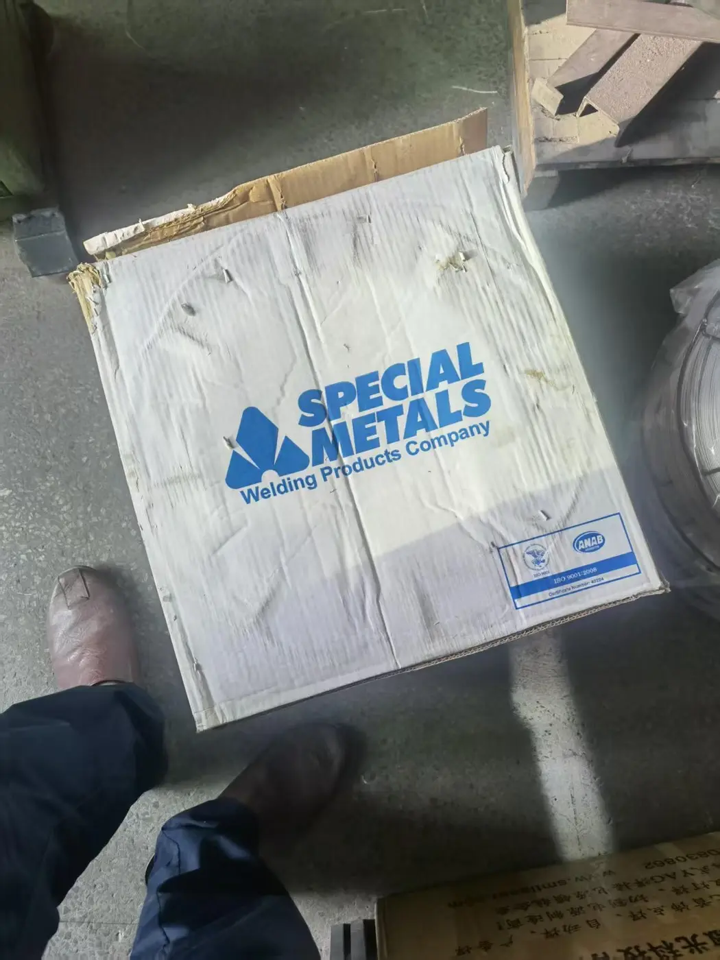 Welding wire in protective manufacturer packaging